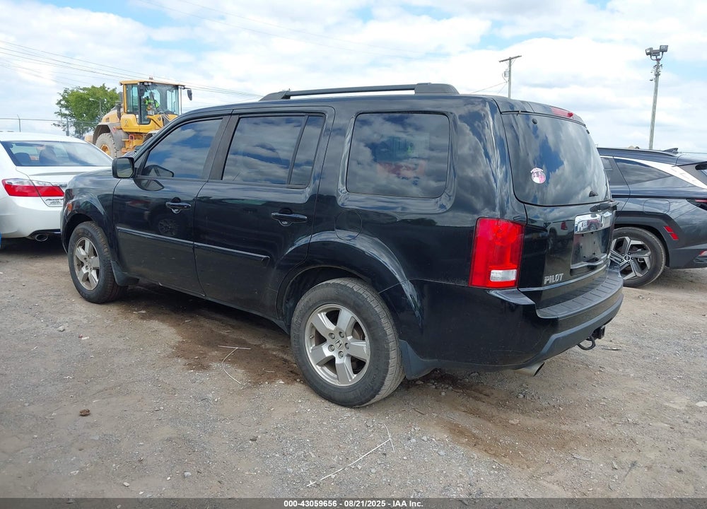 2011 HONDA PILOT EX-L VIN: 5FNYF4H54BB062515