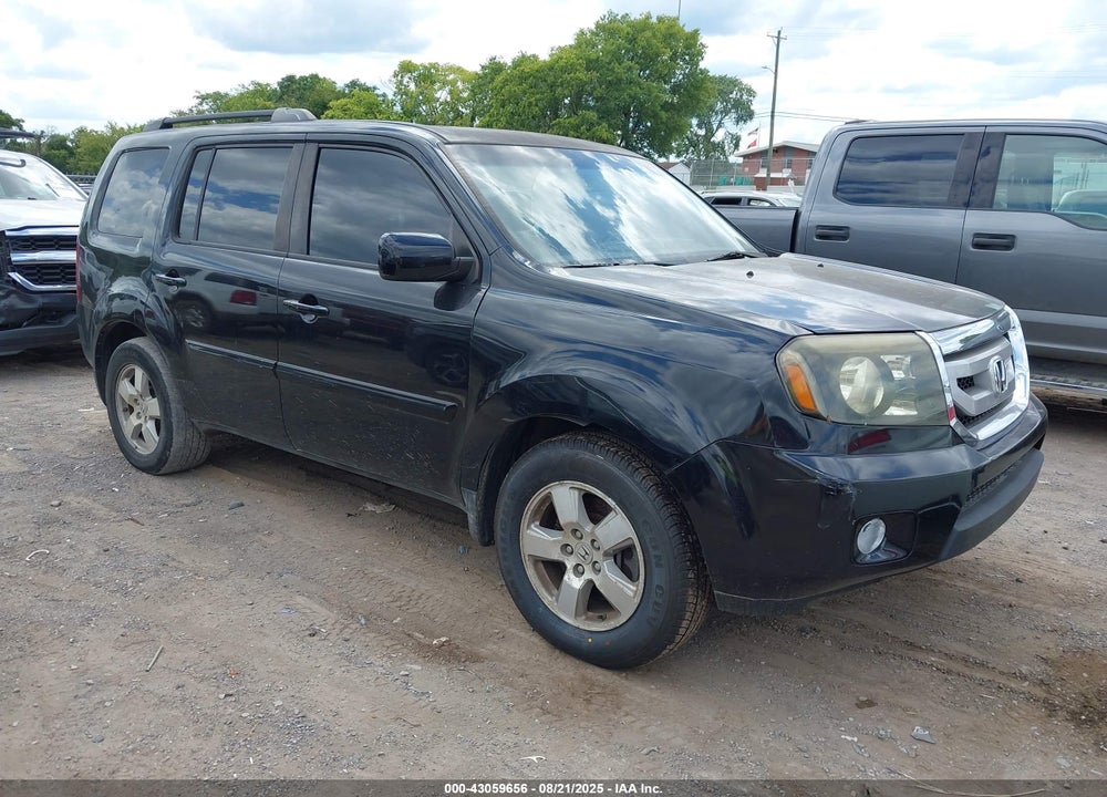 2011 HONDA PILOT EX-L VIN: 5FNYF4H54BB062515