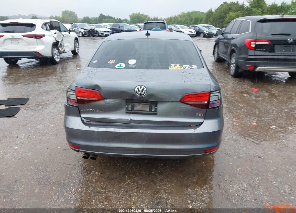 2016 VOLKSWAGEN JETTA VIN: 3VWD67AJ1GM209879