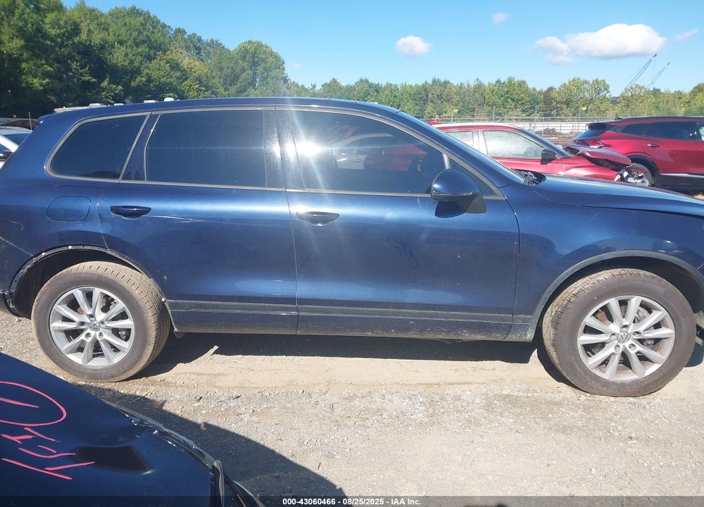 2014 VOLKSWAGEN TOUAREG VIN: WVGEF9BP7ED007770