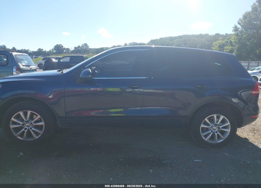 2014 VOLKSWAGEN TOUAREG VIN: WVGEF9BP7ED007770
