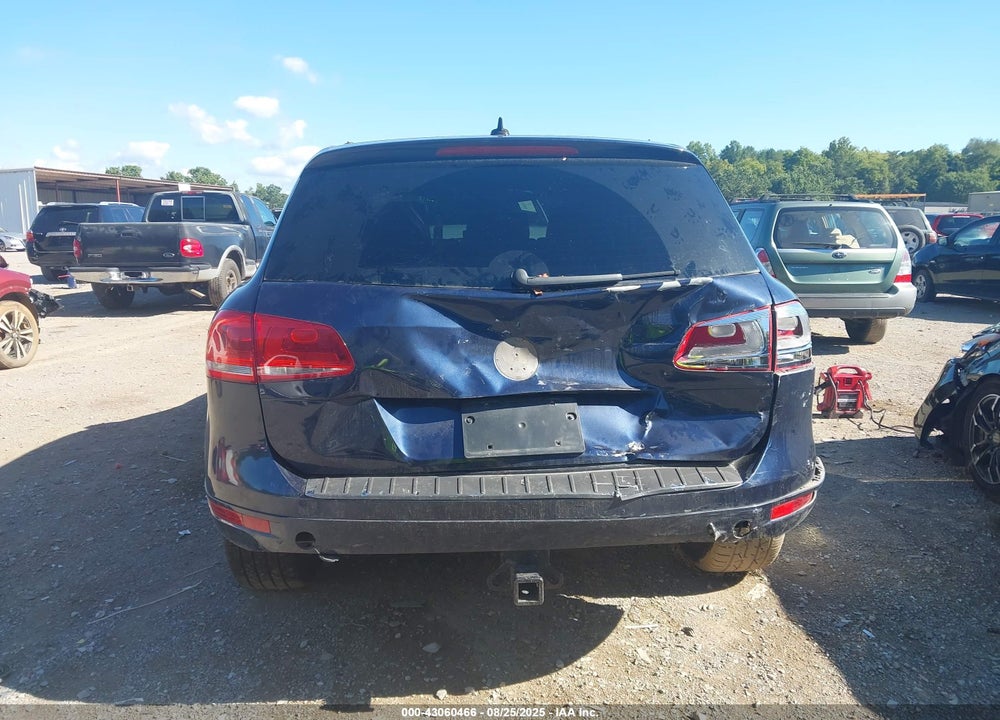 2014 VOLKSWAGEN TOUAREG VIN: WVGEF9BP7ED007770