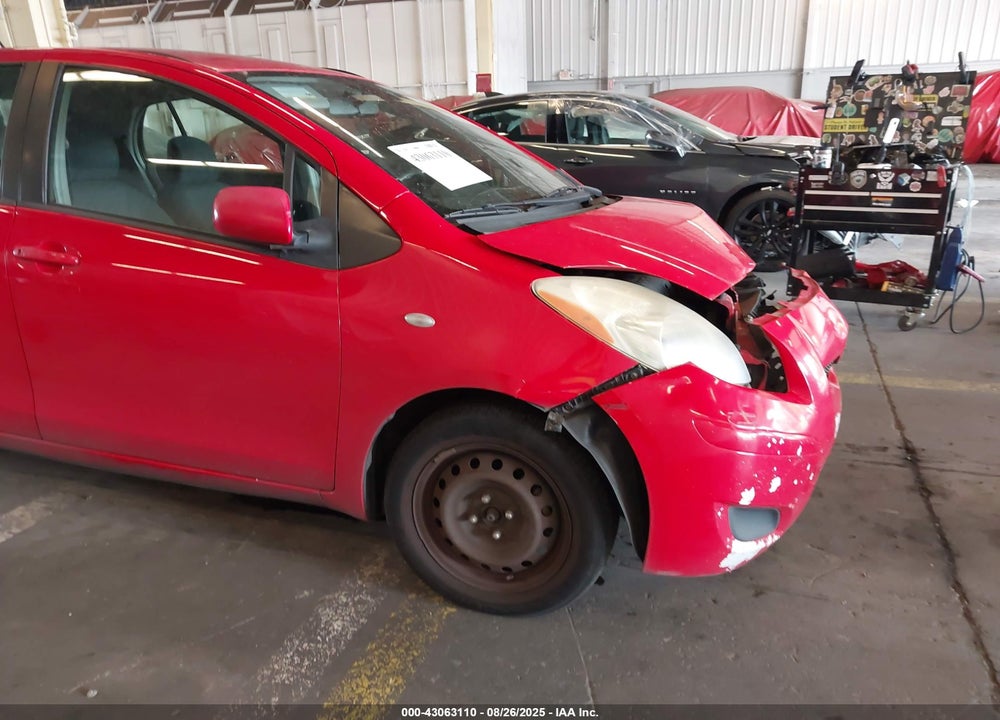 2009 TOYOTA YARIS VIN: JTDKT903X95245631