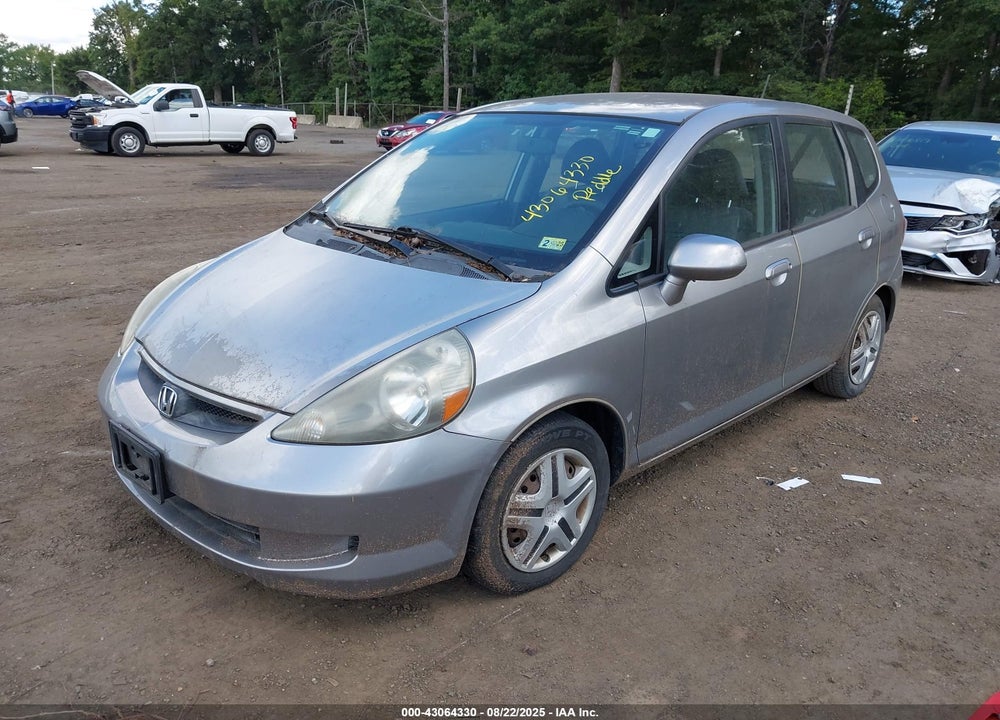2007 HONDA FIT VIN: JHMGD38497S059234
