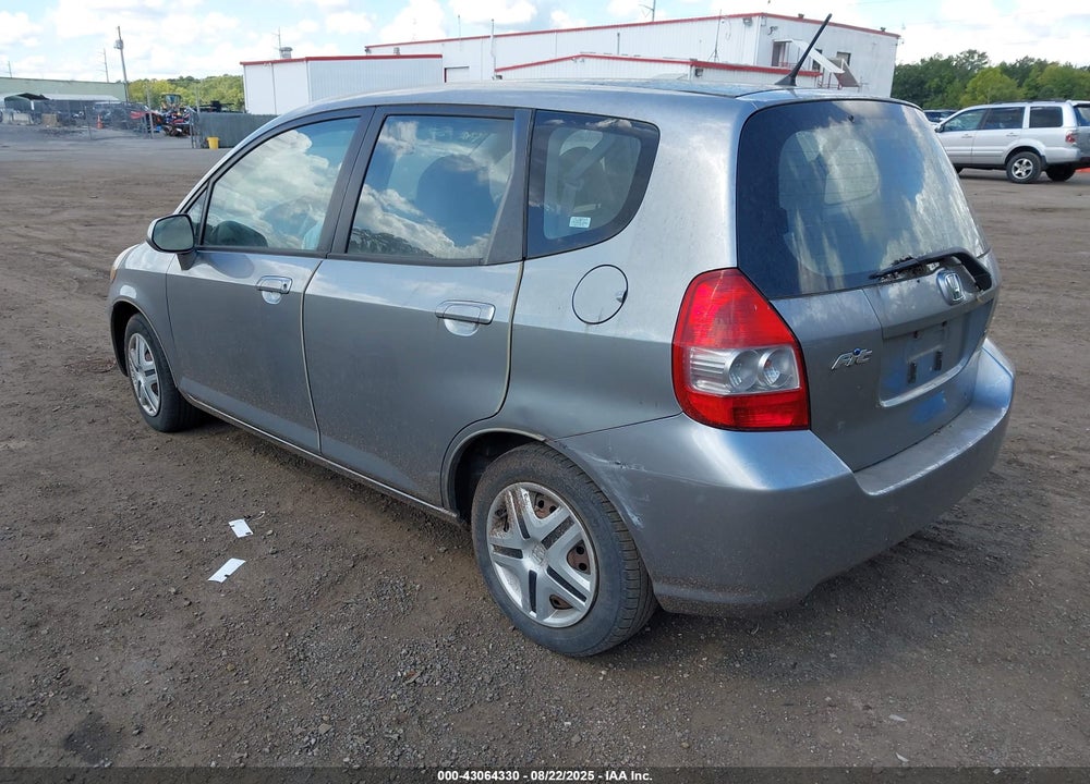 2007 HONDA FIT VIN: JHMGD38497S059234