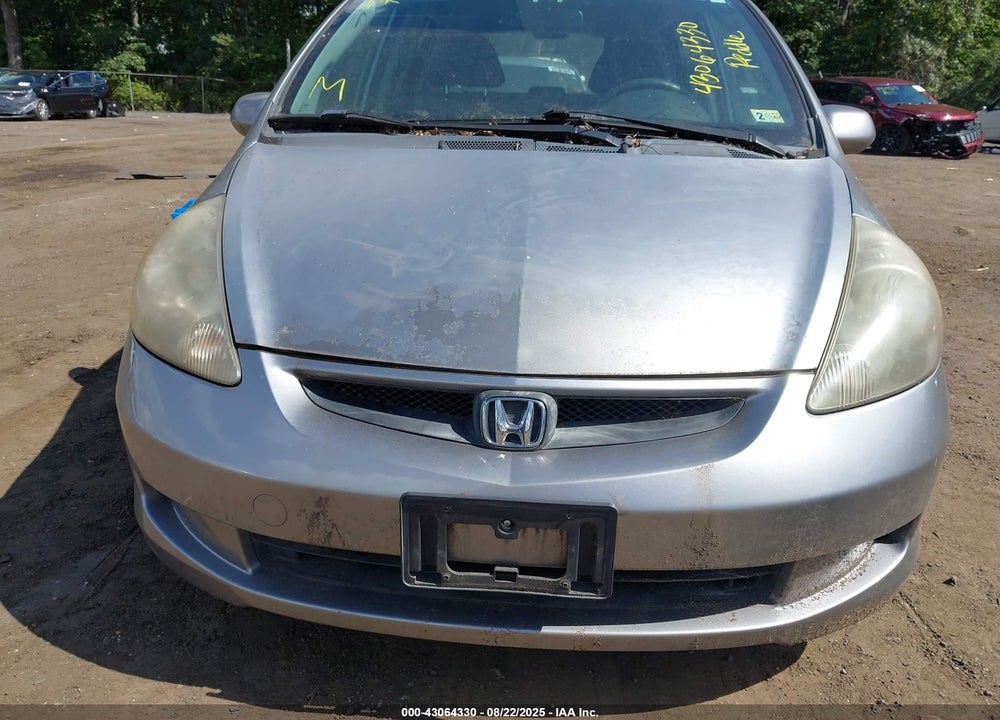 2007 HONDA FIT VIN: JHMGD38497S059234