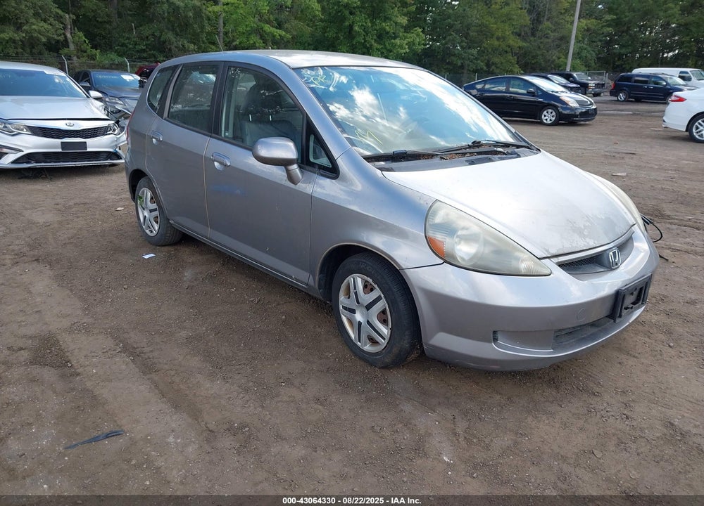 2007 HONDA FIT VIN: JHMGD38497S059234