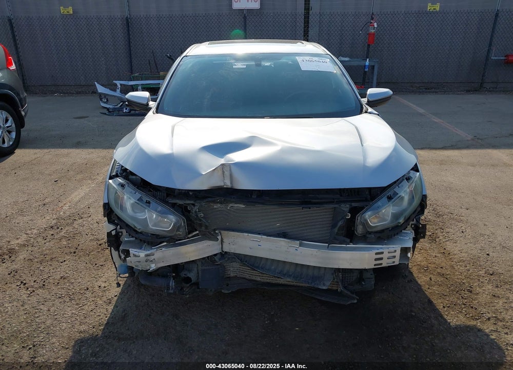 2018 HONDA CIVIC VIN: 2HGFC1E54JH703479