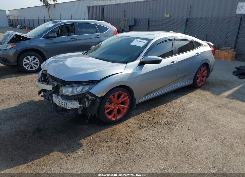 2018 HONDA CIVIC VIN: 2HGFC1E54JH703479
