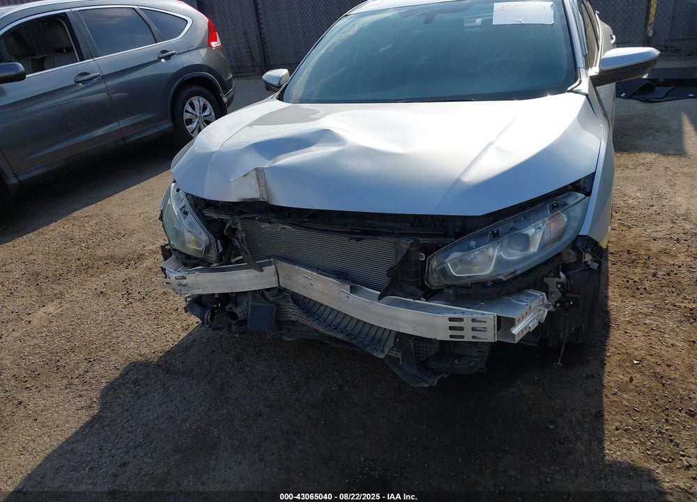 2018 HONDA CIVIC VIN: 2HGFC1E54JH703479