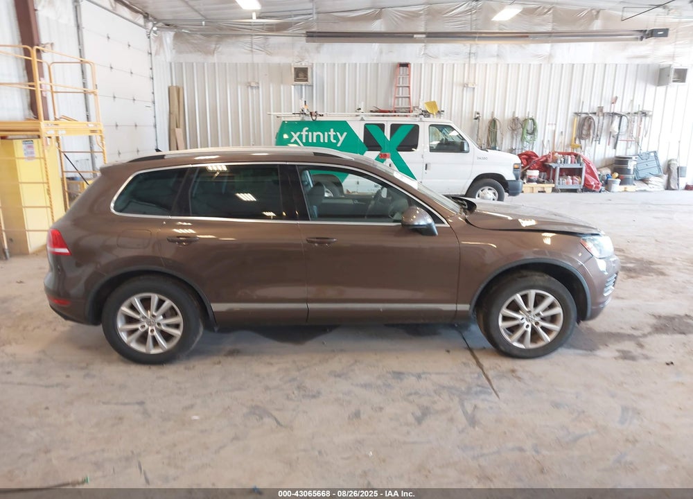 2013 VOLKSWAGEN TOUAREG VIN: WVGEF9BPXDD008121