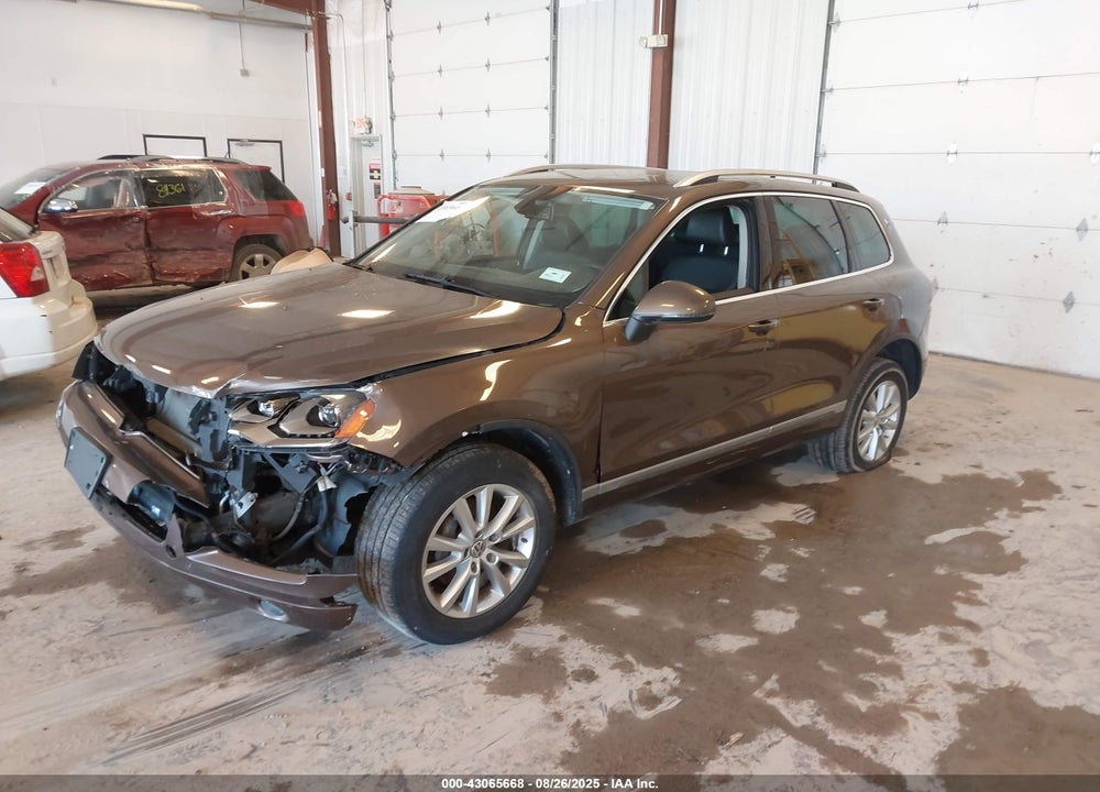 2013 VOLKSWAGEN TOUAREG VIN: WVGEF9BPXDD008121