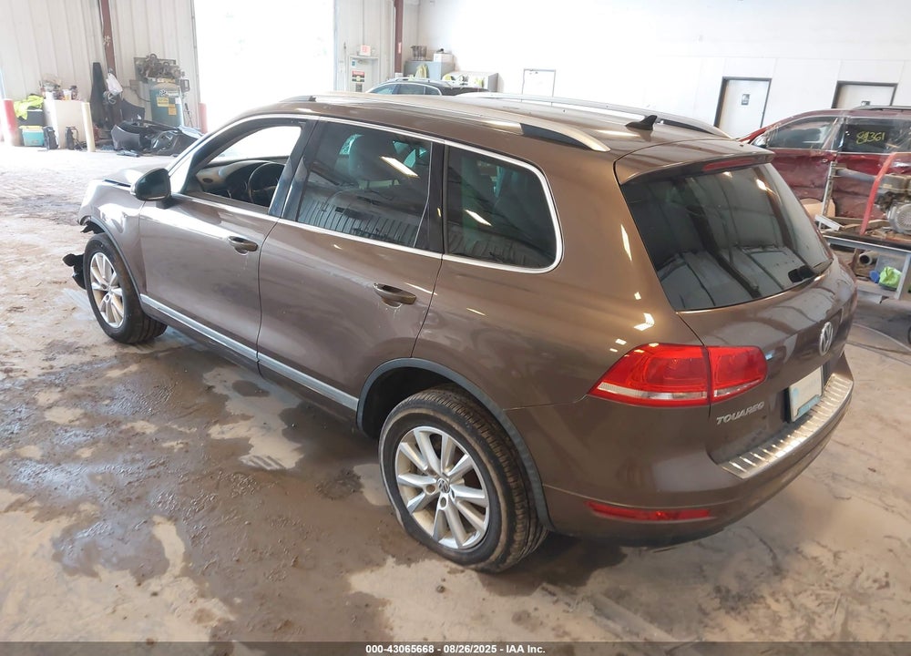 2013 VOLKSWAGEN TOUAREG VIN: WVGEF9BPXDD008121