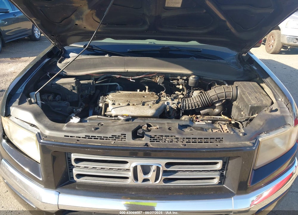 2006 HONDA RIDGELINE RTL VIN: 2HJYK16586H519027