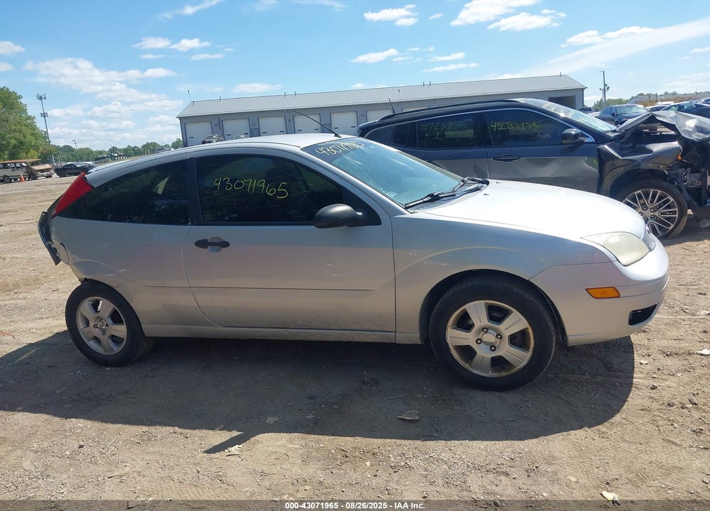 2007 FORD FOCUS VIN: 1FAFP31N27W218083