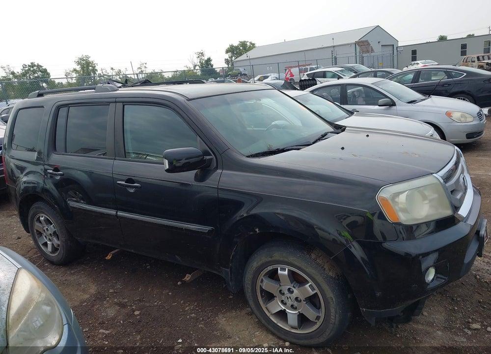 2011 HONDA PILOT TOURING VIN: 5FNYF4H97BB070823