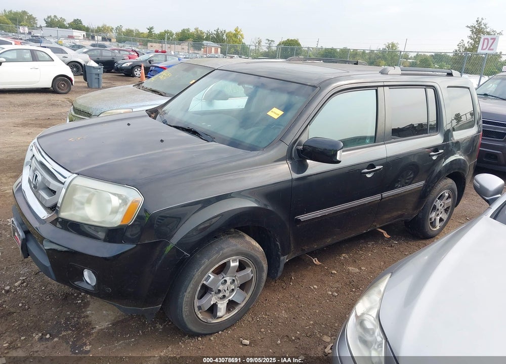 2011 HONDA PILOT TOURING VIN: 5FNYF4H97BB070823