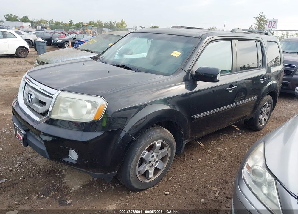 2011 HONDA PILOT TOURING VIN: 5FNYF4H97BB070823