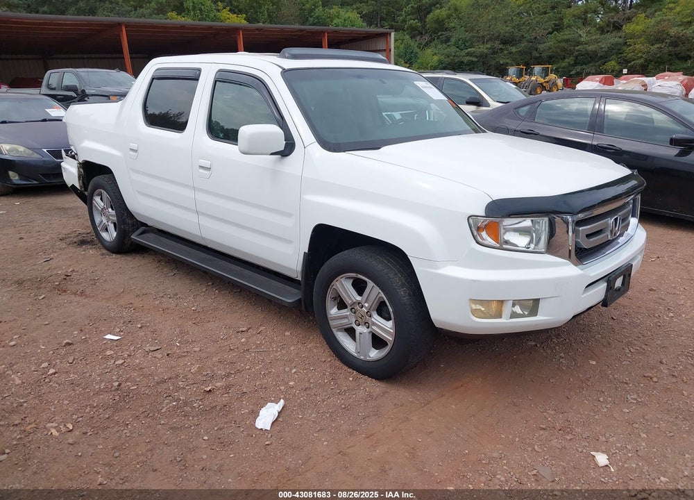 2010 HONDA RIDGELINE RTL VIN: 5FPYK1F58AB006130