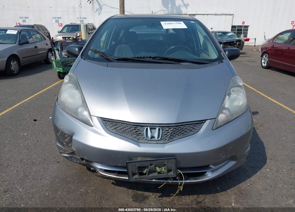 2009 HONDA FIT VIN: JHMGE88219S008371