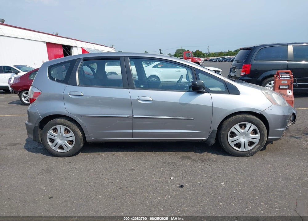 2009 HONDA FIT VIN: JHMGE88219S008371