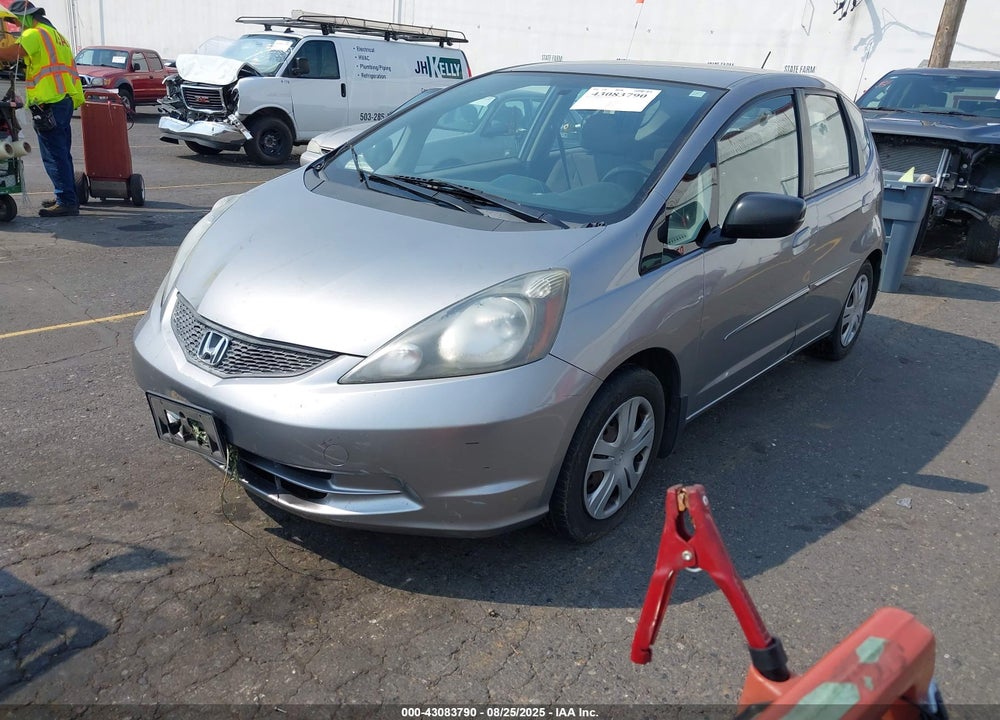 2009 HONDA FIT VIN: JHMGE88219S008371