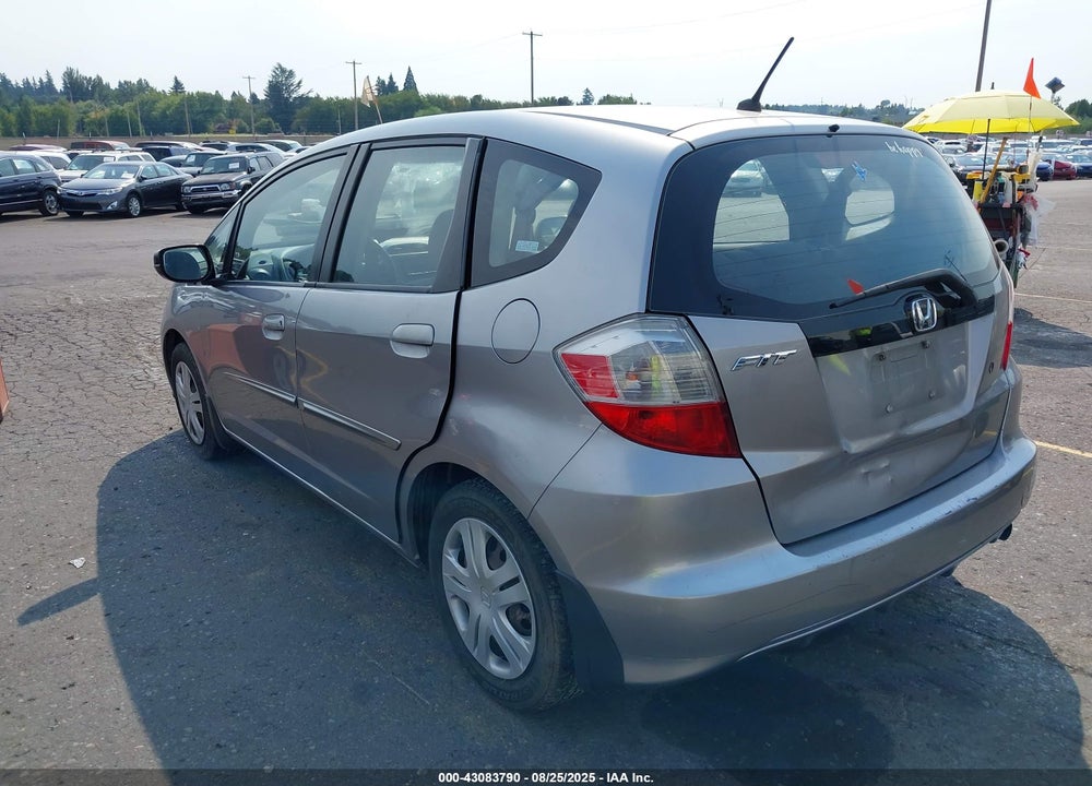 2009 HONDA FIT VIN: JHMGE88219S008371
