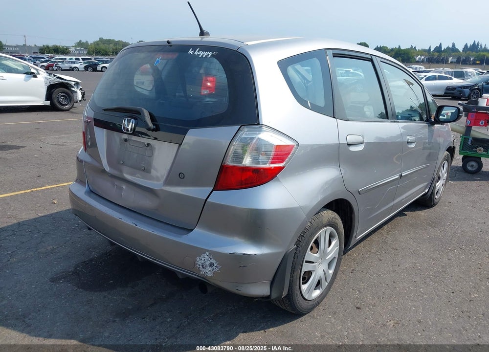 2009 HONDA FIT VIN: JHMGE88219S008371