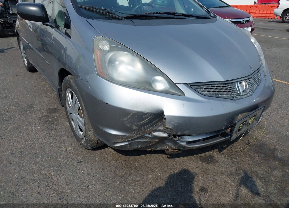 2009 HONDA FIT VIN: JHMGE88219S008371