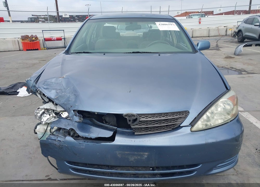 2002 TOYOTA CAMRY LE VIN: JTDBE32K120041153