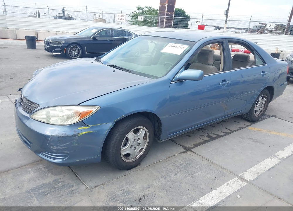 2002 TOYOTA CAMRY LE VIN: JTDBE32K120041153