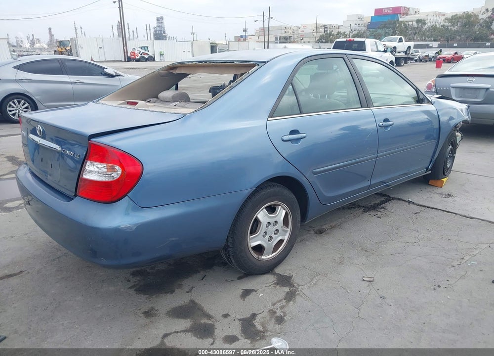 2002 TOYOTA CAMRY LE VIN: JTDBE32K120041153