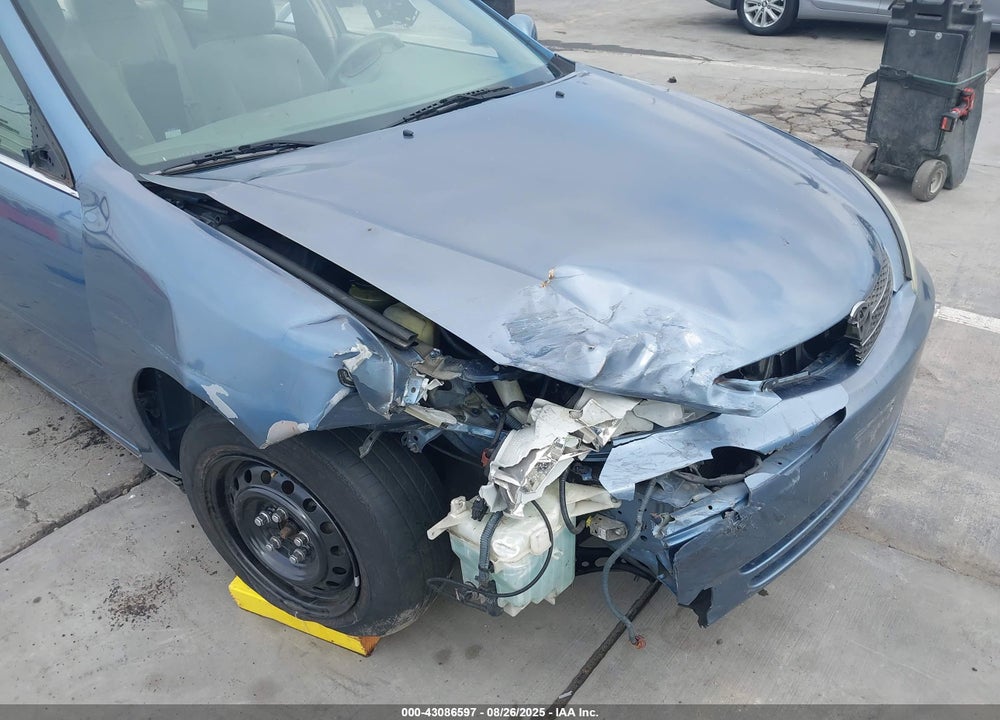 2002 TOYOTA CAMRY LE VIN: JTDBE32K120041153