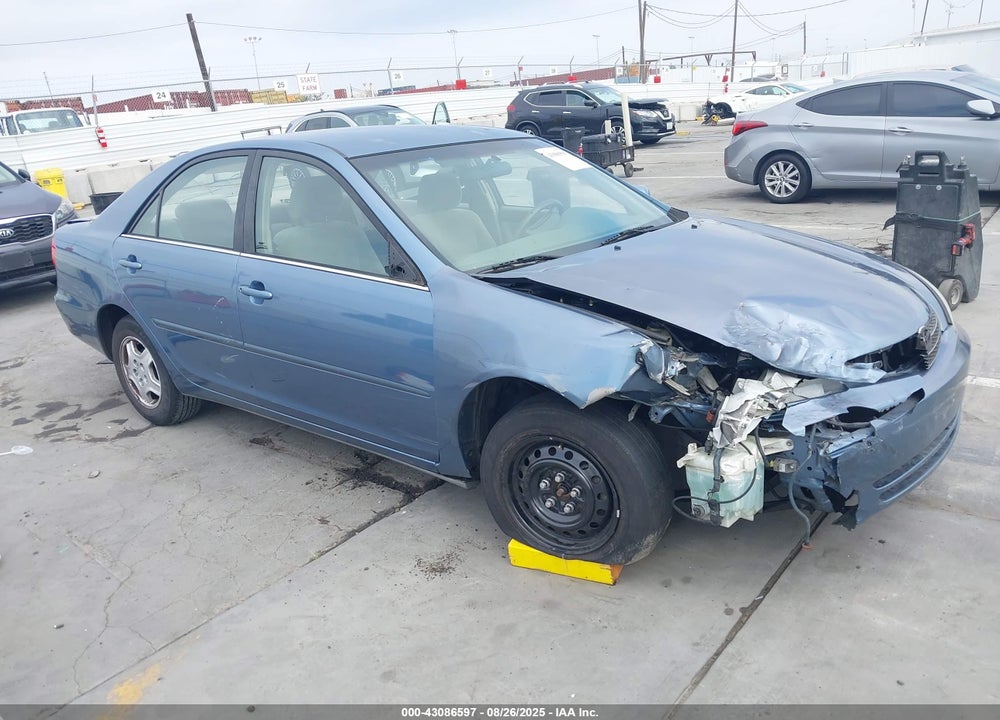 2002 TOYOTA CAMRY LE VIN: JTDBE32K120041153