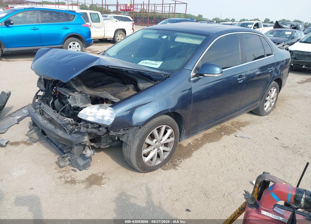 2010 VOLKSWAGEN JETTA VIN: 3VWRX7AJ3AM027207
