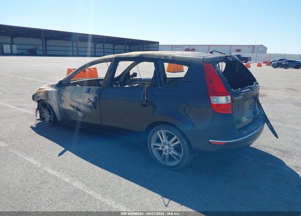 2009 HYUNDAI ELANTRA TOURING VIN: KMHDC86E69U039171