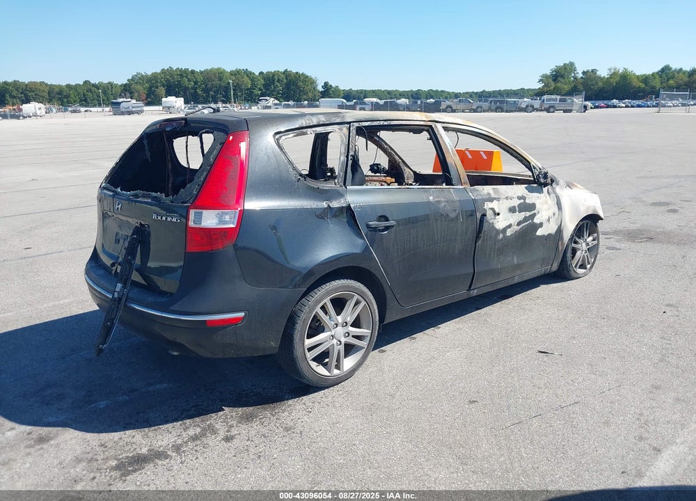 2009 HYUNDAI ELANTRA TOURING VIN: KMHDC86E69U039171