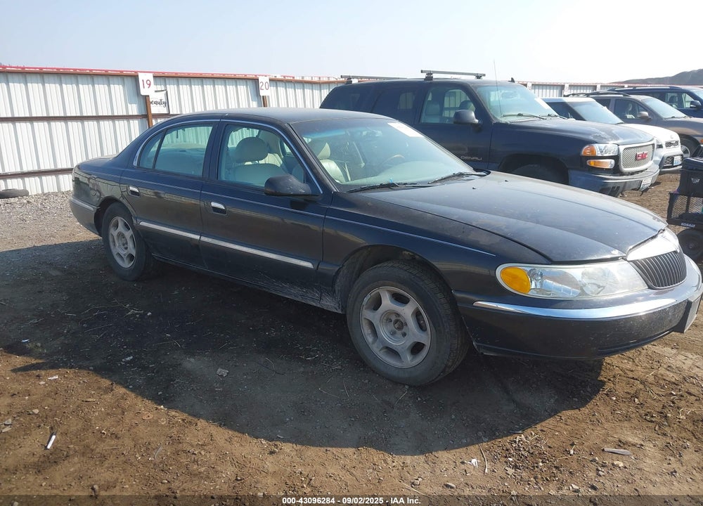 1999 LINCOLN CONTINENTAL VIN: 1LNHM97V8XY693369