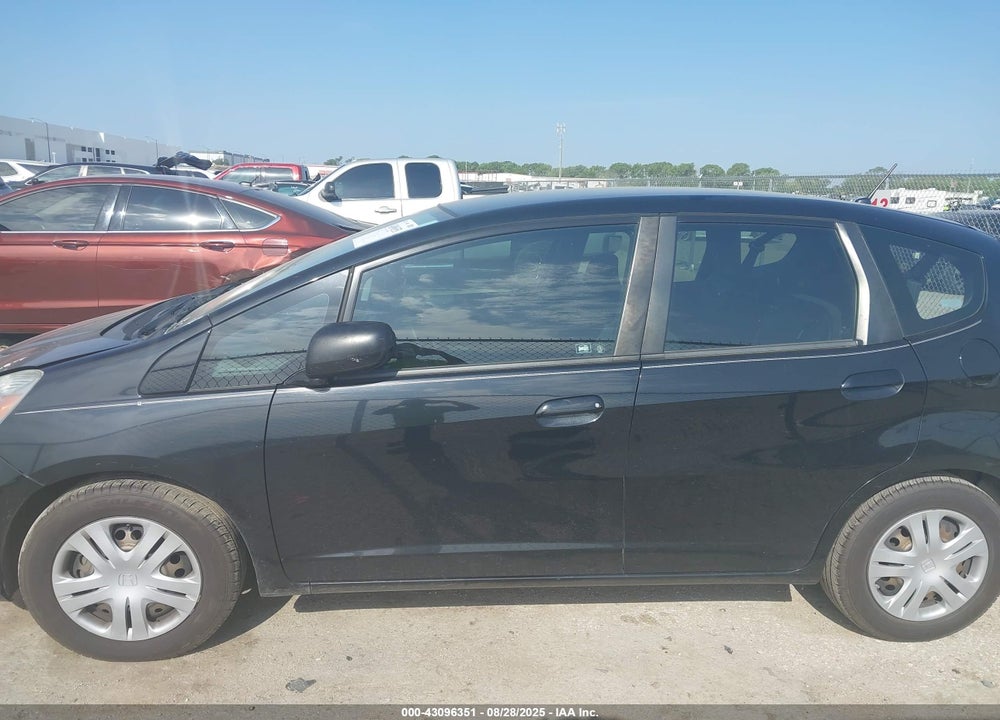 2009 HONDA FIT VIN: JHMGE88279S063651