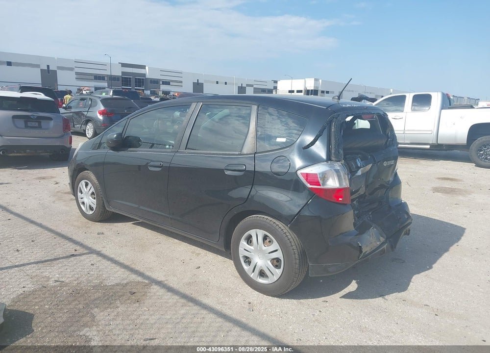 2009 HONDA FIT VIN: JHMGE88279S063651