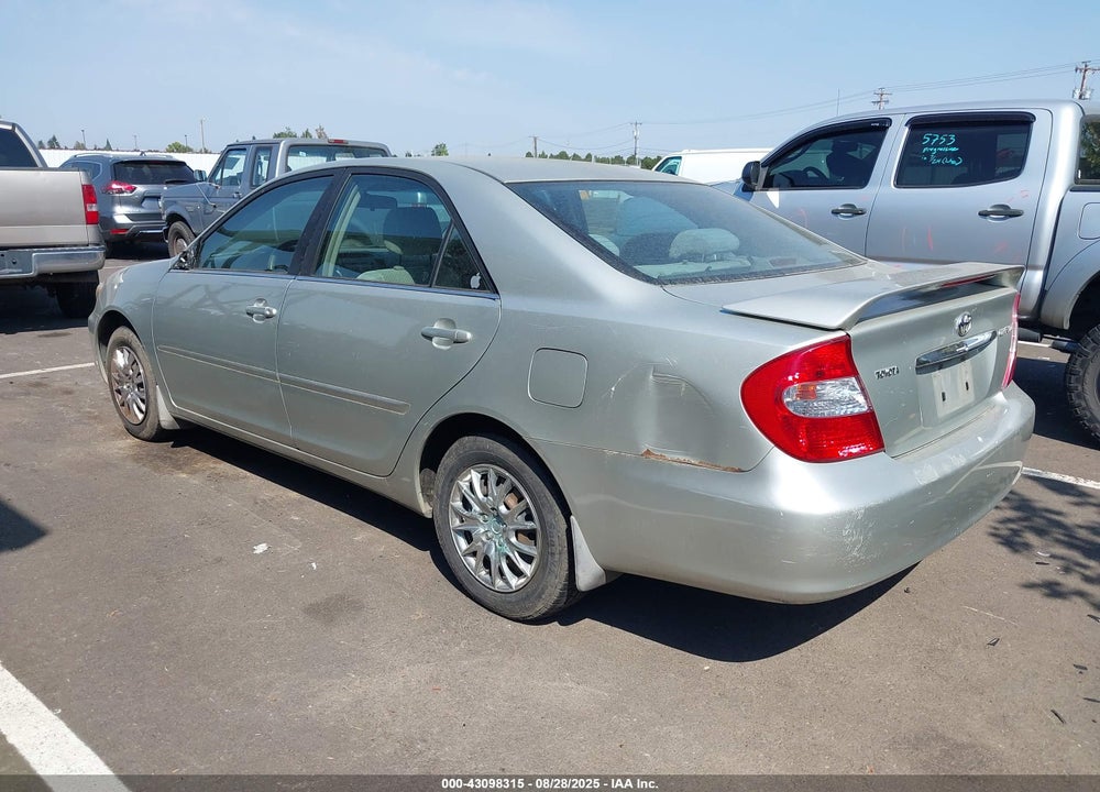 2003 TOYOTA CAMRY LE VIN: JTDBE32K330157908
