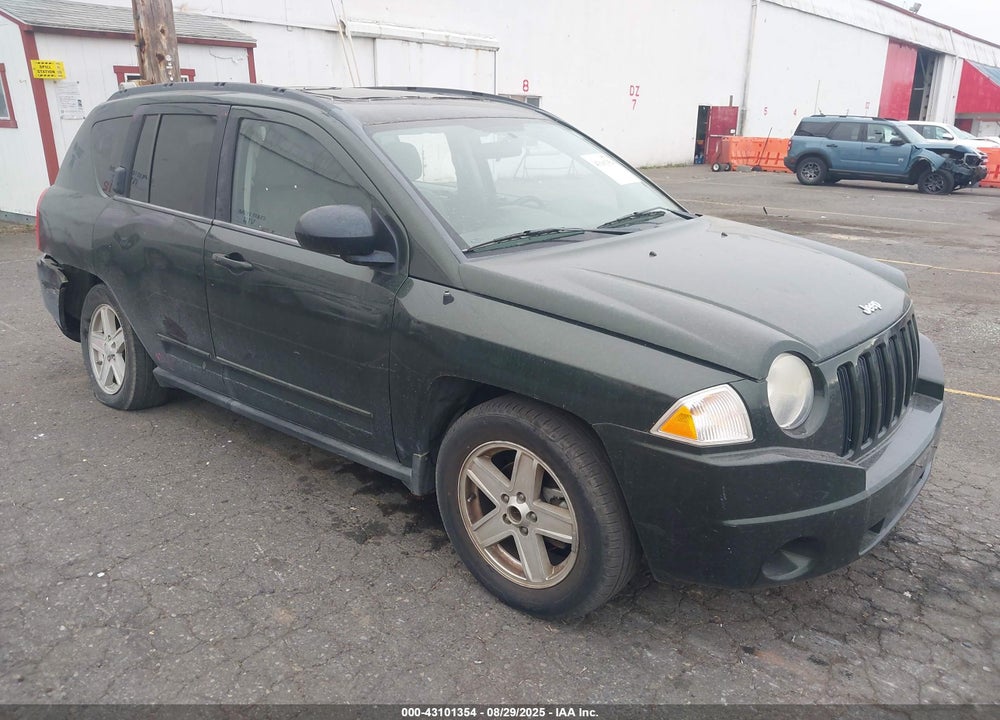 2010 JEEP COMPASS VIN: 1J4NT4FA2AD598729