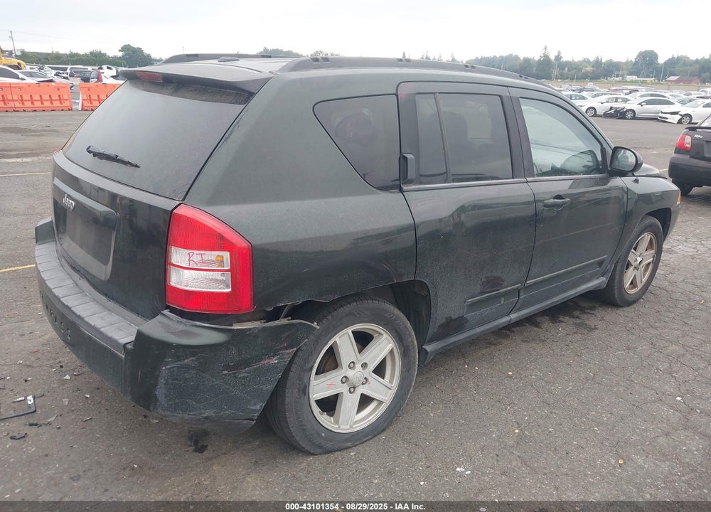 2010 JEEP COMPASS VIN: 1J4NT4FA2AD598729