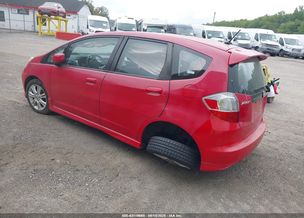 2009 HONDA FIT VIN: JHMGE88429S066118