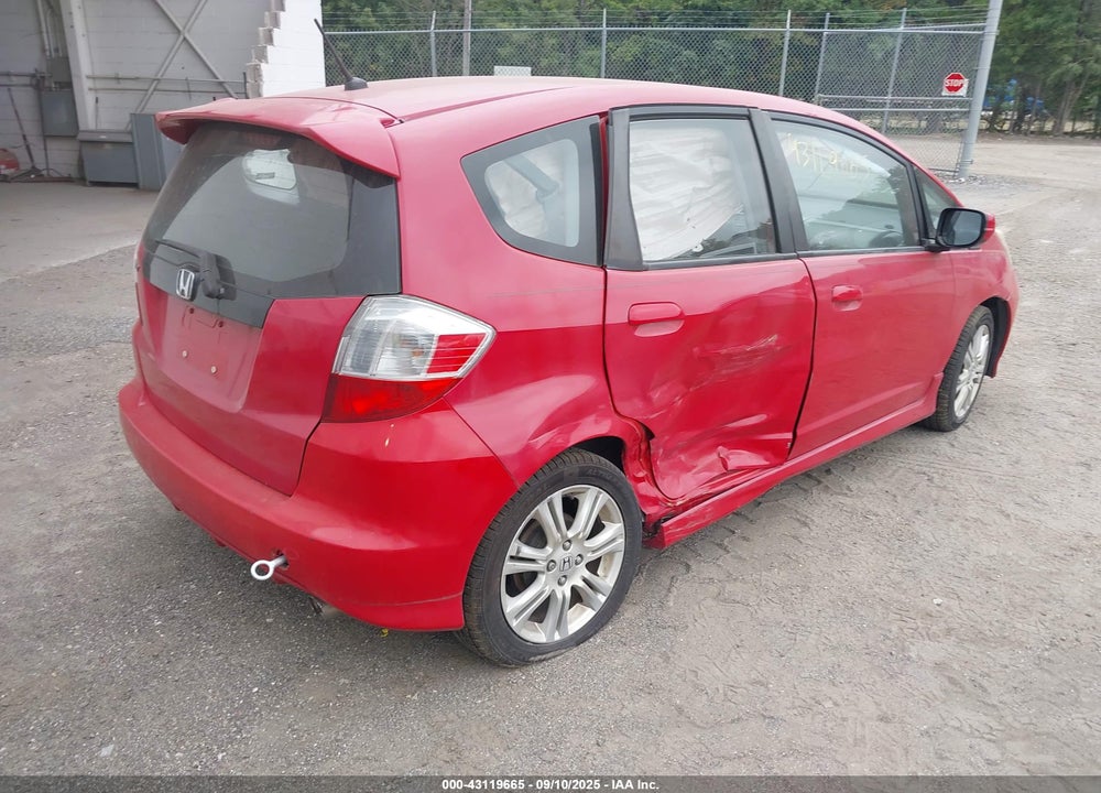 2009 HONDA FIT VIN: JHMGE88429S066118