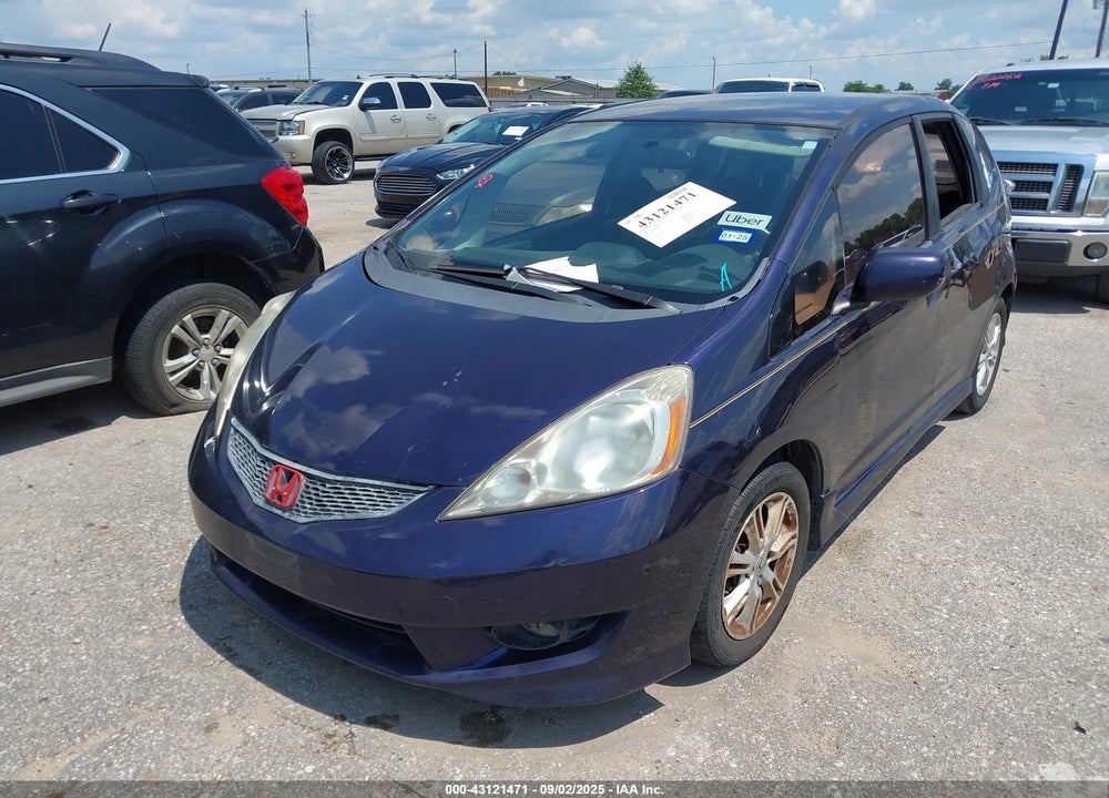 2009 HONDA FIT VIN: JHMGE884X9S074094