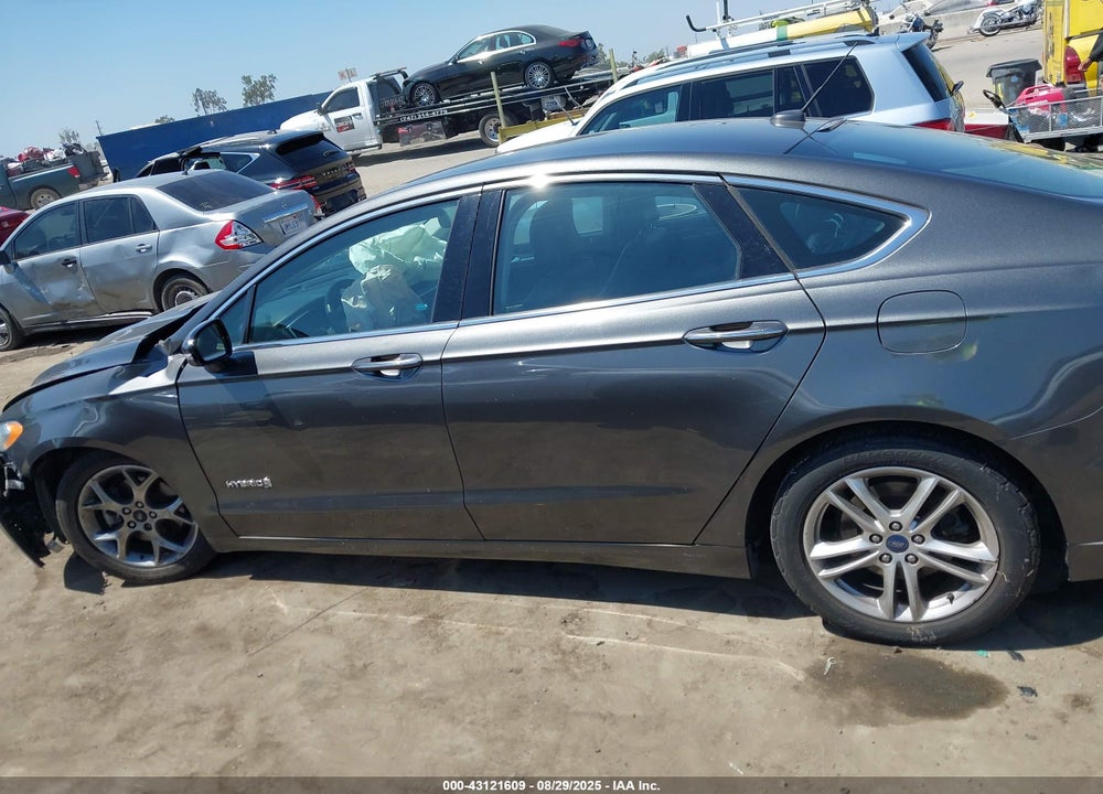 2016 FORD FUSION HYBRID TITANIUM VIN: 3FA6P0RU6GR331077