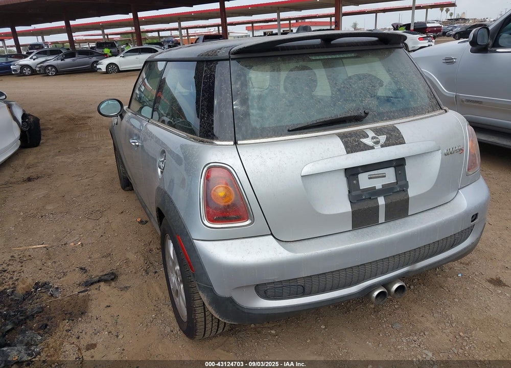 2009 MINI COOPER VIN: WMWMF73529TW81495
