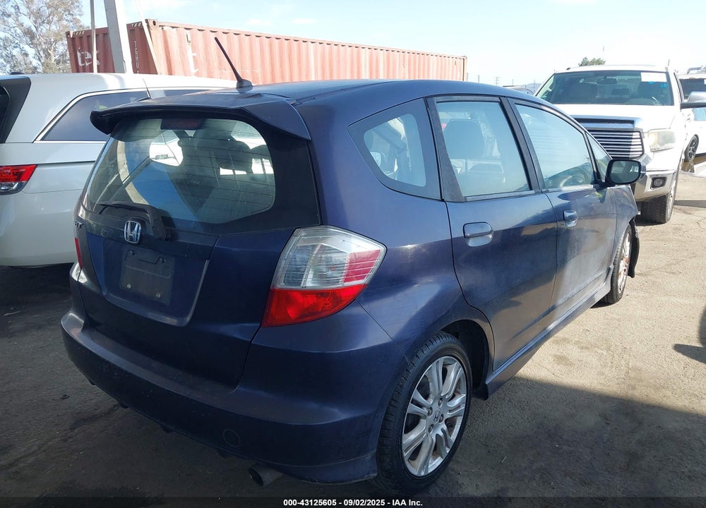 2009 HONDA FIT VIN: JHMGE88469S033252