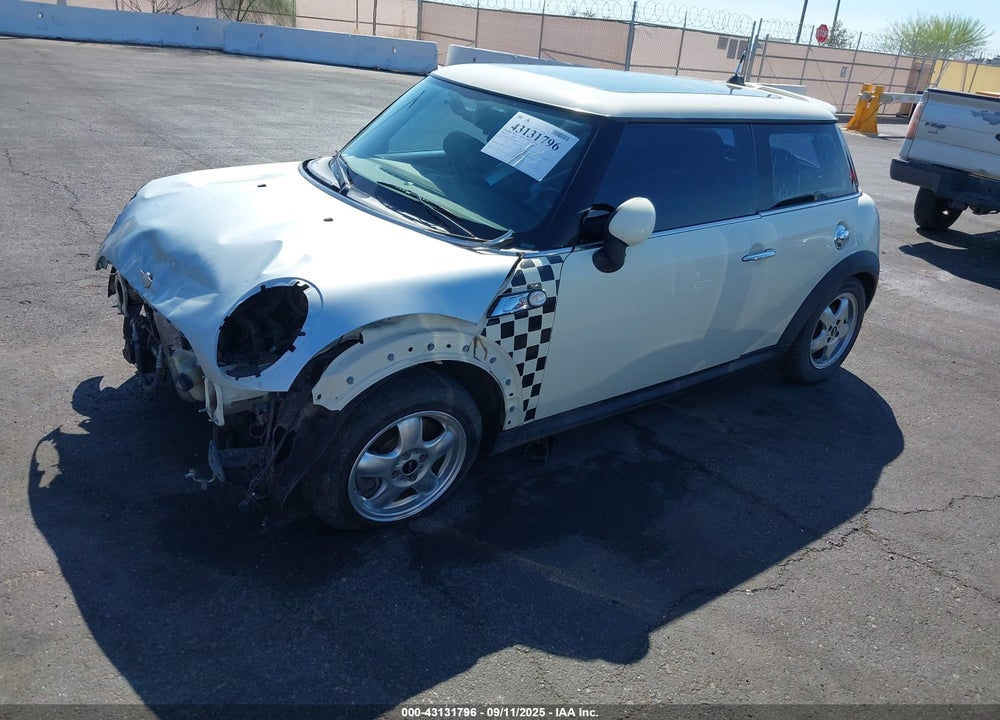 2009 MINI COOPER S VIN: WMWMF73599TW87858